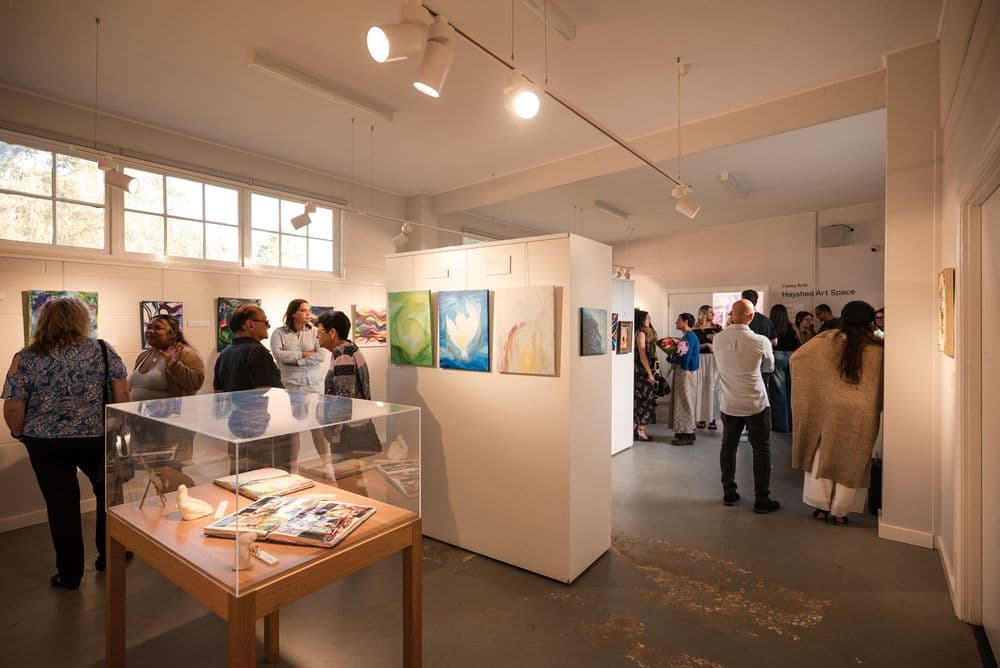 Gallery exhibition with visitors